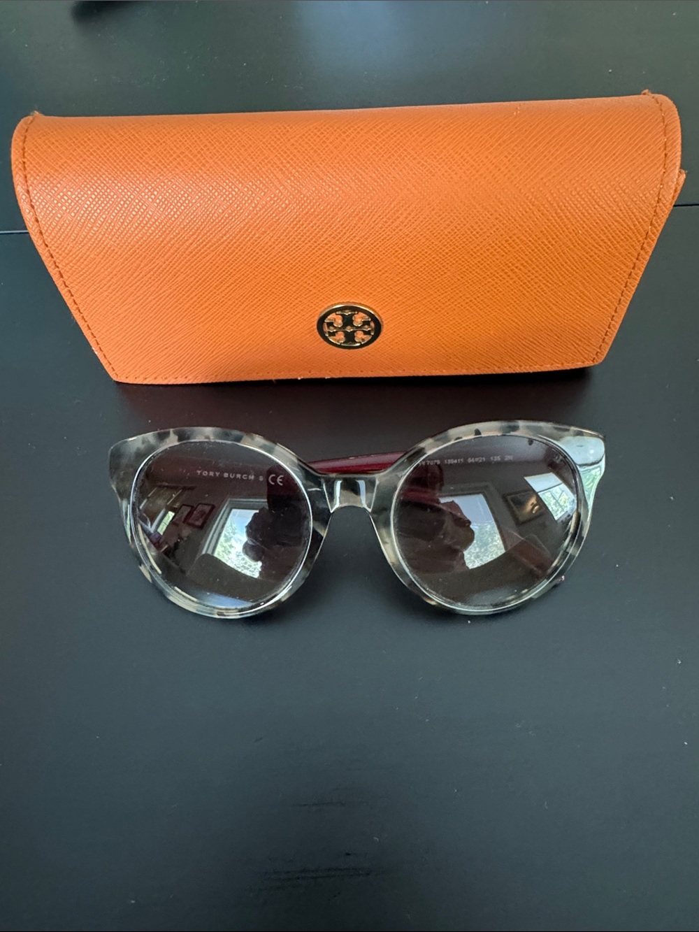 Tory Burch sunglasses.